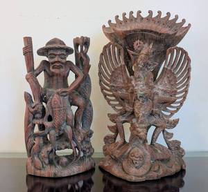 lot 87 image: ML - Pair of Carved Wood Figurines - Fisherman with Pole & Garuda-Vishnu Balinese Wooden Sculpture