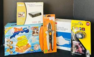 lot 284C image: B1 - RCA RP5400 Alarm Clock, Fiskars Pruner, Stanley Headlamp HL15, 3M Aura N95 (20-pack), Zorb-Eel Ultra-Absorbent Towels