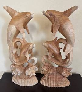 lot 104R image: K - Pair of Wooden Dolphin Sculptures