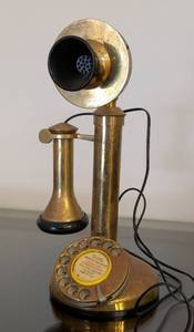 lot 113A image: LR - GEC Made in England Brass Candlestick Telephone - 12-inch Tall - Not Functioning