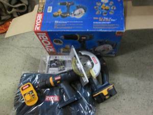 lot 18 image: Ryobi saw and drill, 2 batteries, n...
