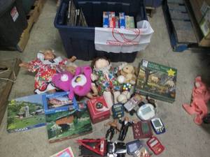 lot 33 image: Covered tote filled with toys puzzl...