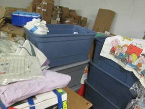 lot 37 image: 2 Large tubs filled with bedding an...