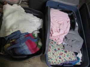 lot 51 image: 2 Covered totes of ladies clothes...