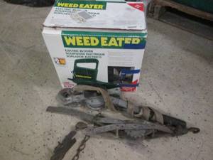 lot 58 image: Weed eater and 2 come alongs...