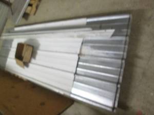 3 10' sheets of steel siding, one s...