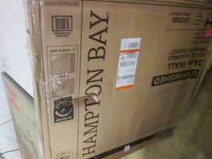 lot 103 image: Hampton Bay 36.x.36 unfinished Sha...