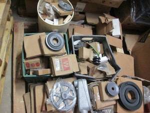 lot 107 image: Pallet full of assorted pulleys and...