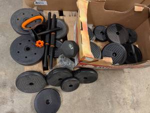 lot 123 image: Weight bar and nice assortment of weights, along with a 15 lb dumbbell