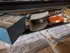 lot 136 image: Organizer with hardware, jig saw, speaker, door knobs, and more