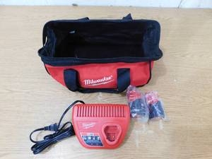 lot 57 image: (2) Milwaukee - M12 2.0 ah 1.5 ah Batteries w Carrying Bag and Charger