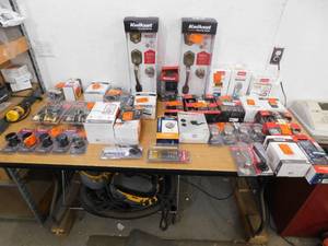 lot 107 image: Huge lot of assorted door knobs, pulls, and hardware.