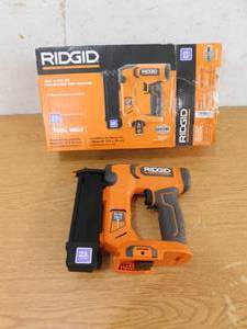 lot 118 image: New- RIDGID 18V Cordless 23-Gauge 1-38 in. Headless Pin Nailer (Tool Only)