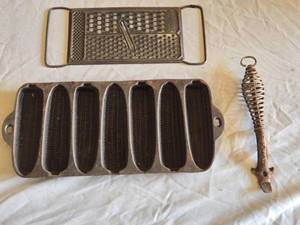 lot 33 image: Antique Cast Iron Kitchenware Set including Corn Cob Pan, Spring Handle, and All-In-One Grater