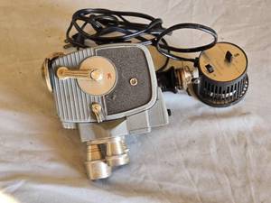 lot 36 image: Keystone K-4C 8mm Movie Camera with AW Fireball Super 8 Movie Light