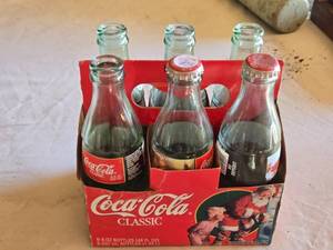 lot 56 image: Coca-Cola Classic 6-Pack Bottles with Santa Design