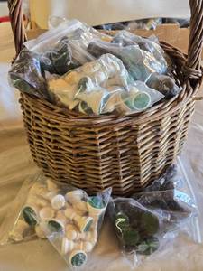 lot 83 image: Bags of Chess Pieces in Wicker Basket