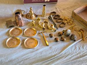 lot 101 image: Assorted Brass and Metal Decorative Items Including Plates, Shoe Figurine, Napkin Rings and Knobs