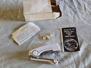 lot 108 image: Sun Handheld Sewing Machine with Accessories