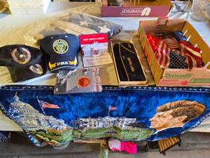 lot 113 image: United States Military Memorabilia Collection including Hats, Flags, and DVD - Vintage Flag in Plastic