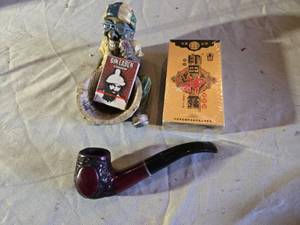 lot 132 image: Bin Laden Condom Pack, Pipe, and Figurine Ashtray