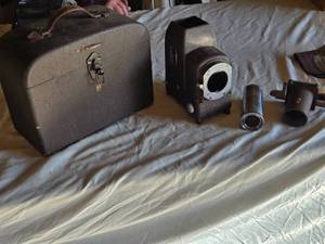 lot 176 image: Bell & Howell Filmo Duo-Master Slide Projector with Accessories