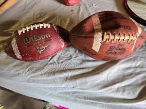 lot 196 image: Wilson Footballs Including NFL and NCAA Models
