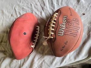 lot 200 image: Lot of 2 Footballs including Wilson NFL Leather Football