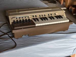 lot 215 image: Emenee Audion Electric Organ - Works, Takes Time to Air Up