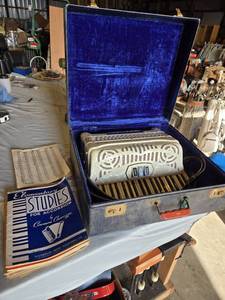 lot 222 image: Vintage Venucci Accordion with Case and Sheet Music - Appears in Good Condition