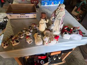 lot 250 image: Lot of Christmas Decorations including Snowman Figurines, Santa Figure, and Various Ornaments