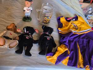lot 280 image: Minnesota Twins Bobblehead, Minnesota Vikings Mug, Goodwrench Service Plus NASCAR Bears, and Vikings Cheerleading Outfit
