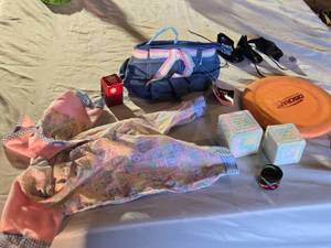 lot 297 image: Denim Handbag with Rainbow Strap, Doll Outfit, and Assorted Toys