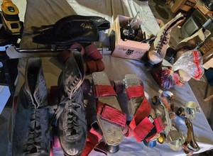 lot 302 image: Vintage Roller Skates, Ice Skates, Box of Skateboard Parts