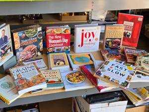 lot 317 image: Collection of Cookbooks including Joy of Cooking, Taste of Home Cookbook, The New Womans Day Cookbook, and more