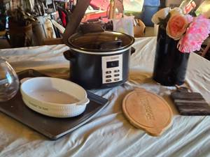 lot 405 image: Slow cooker with digital display, baking dish, cutting boards, and floral arrangement