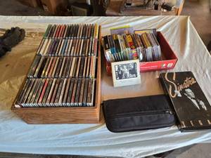 lot 411 image: Lot of CDs and DVDs including Ted Nugent, Nazareth, Janis Joplin, Allman Brothers, Frank Sinatra Vegas Box Set, Beastie Boys Anthology, and Classic Rock Collections