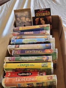 lot 412 image: Box of VHS Tapes including Pocahontas, Shrek, and The Lion King among others