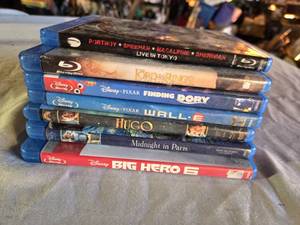 lot 467 image: Blu-ray Disc Collection including Portnoy Live in Tokyo, The Lord of the Rings, Finding Dory, WALL-E, Hugo, Midnight in Paris, and Big Hero 6