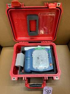 lot 16 image: MSRP $1500 Philips Medical Systems Heartstart HS1 AED Automated External Defibrillator - For Everyday Rescuers Emergencies, Clear Voice Prompts, CPR Coaching with Metronome - Works Great However Needs New Battery &amp Pads Buy Online