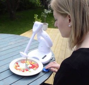 lot 65 image: MSRP $7000 Bestic AB Robotic Arm Assistive Eating Device with Bag and Non-Slip Place Mats - Promotes Autonomy at Mealtimes, Innovative Solution &amp Quality of Life Improvements - See Youtube Works Great No Power Supply - Still Works