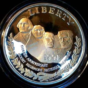 lot 96 image: Proof 1991 90% Silver Dollar Mount Rushmore Commemorative, .773 ASW