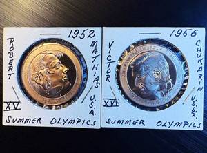 lot 107 image: (2) Mint Fresh High Relief Bronze Olympic Commemorative Medallions, Tougher Finds