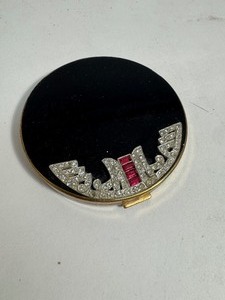 lot 47 image: Vintage Black and Gold Powder Compact