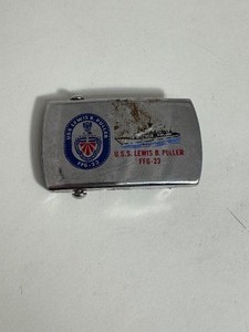 lot 51 image: Vintage U.S.S. Lewis B Puller Belt Buckle