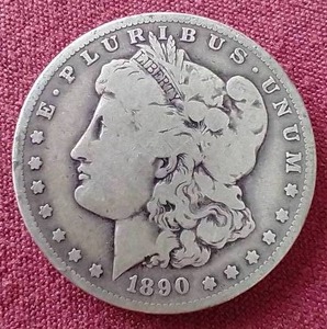 lot 47 image: 1890-O Morgan Dollar