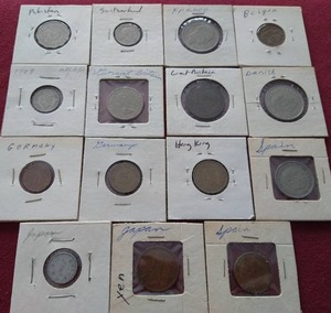 lot 64 image: (15) Vintage Foreign Coins in Flips