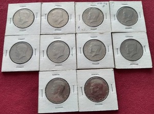 lot 118 image: (10) Kennedy Half Dollars in Flips