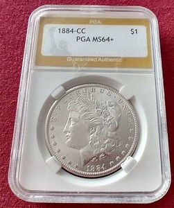 lot 153 image: GORGEOUS 1884-CC Morgan Dollar - PGA MS64