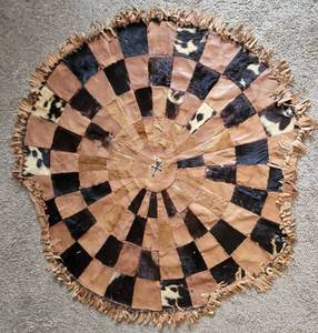 lot 10 image: Vintage Patchwork Leather and Cowhide Circular Are Rug  60 round